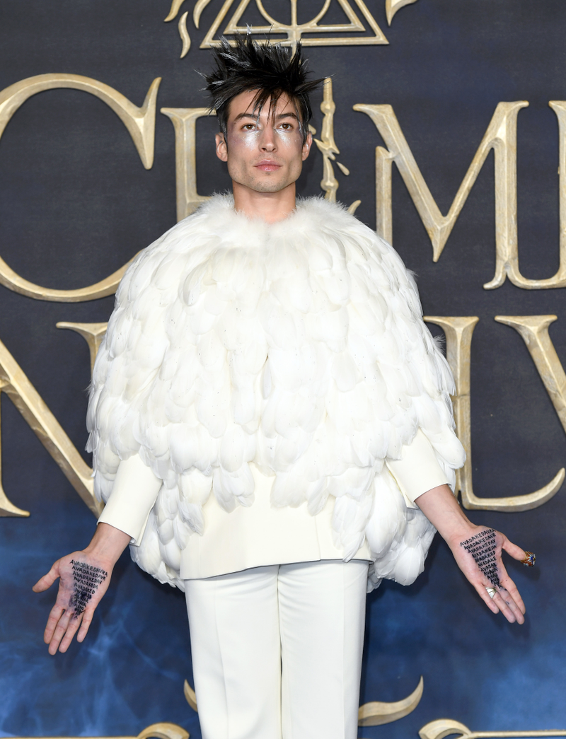 Illustration for article titled Now Ezra Miller is just walking around with The Killing Curse written on his hands, which seems dangerous